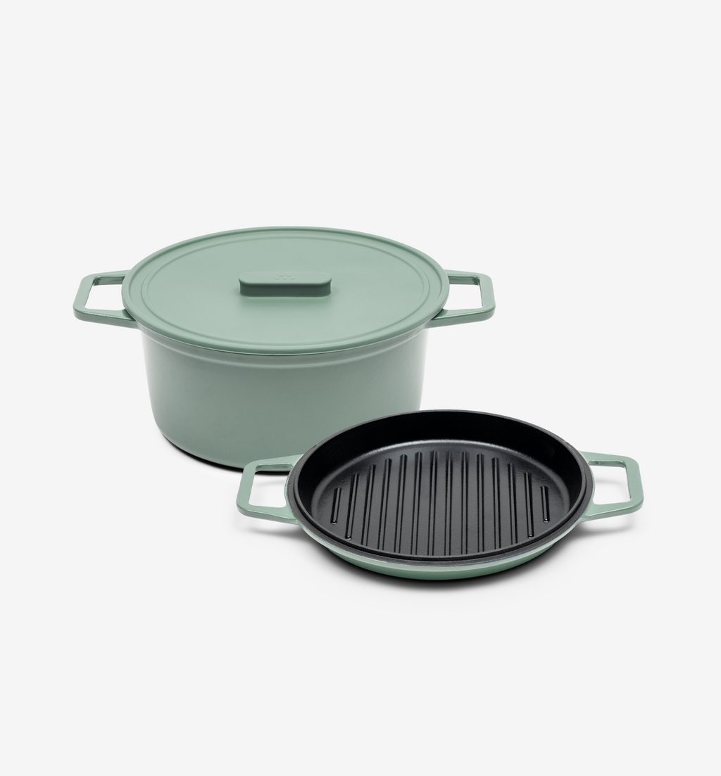 Sage green cast iron Dutch oven with lid and matching grill pan set